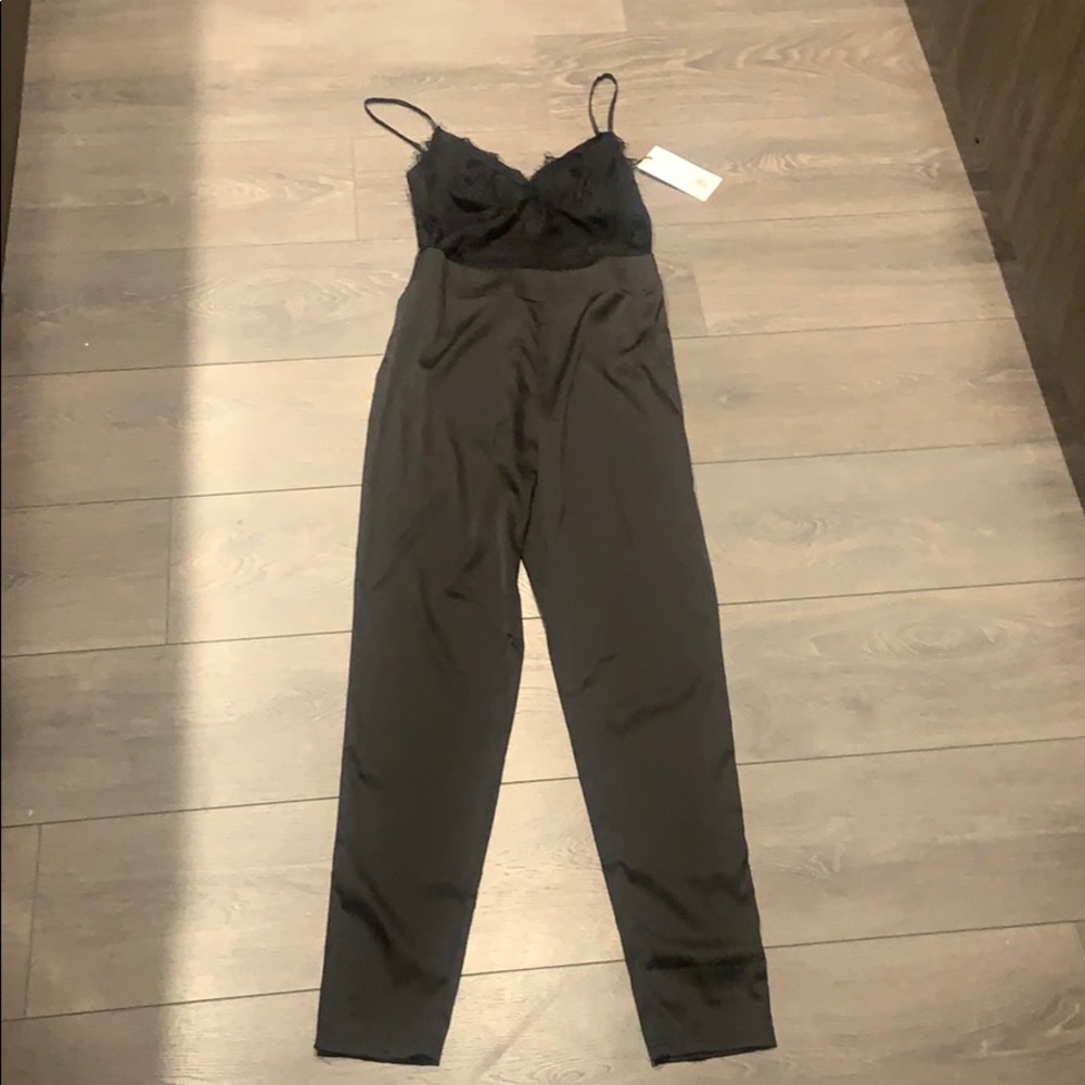 Black satin jumper with lace. Size small